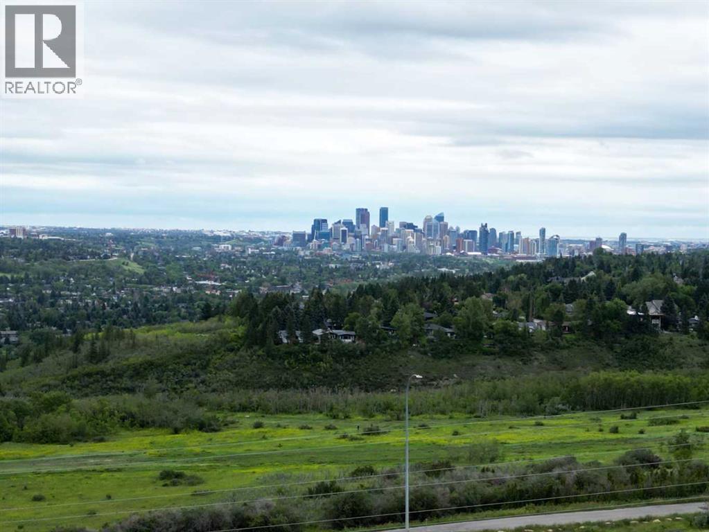 Single Family House Multi-level for Sale in   Village Mews SW Patterson Calgary 