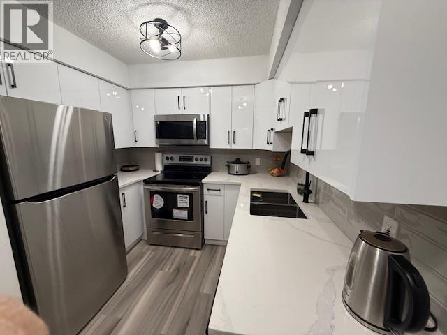 205 1948 COQUITLAM AVENUE, Port Coquitlam