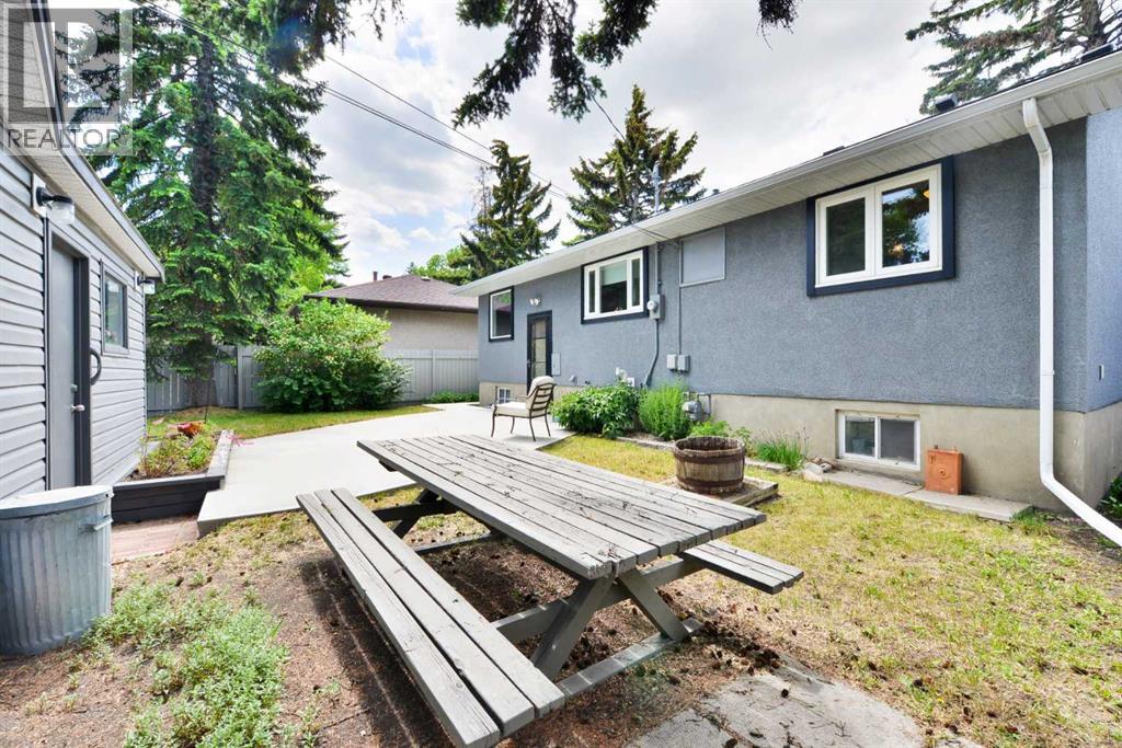 Single Family House Bungalow for Sale in  Layzell Road SW North Glenmore Park Calgary 