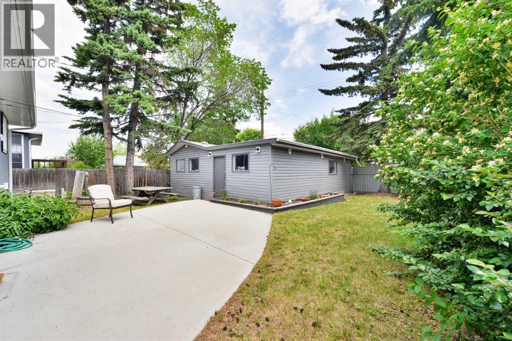 Single Family House Bungalow for Sale in  Layzell Road SW North Glenmore Park Calgary 