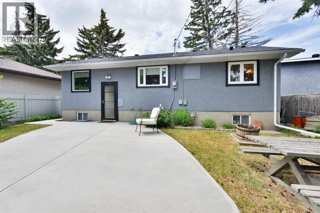 Single Family House Bungalow for Sale in  Layzell Road SW North Glenmore Park Calgary 
