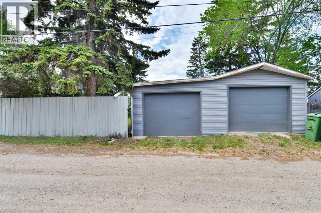 Single Family House Bungalow for Sale in  Layzell Road SW North Glenmore Park Calgary 