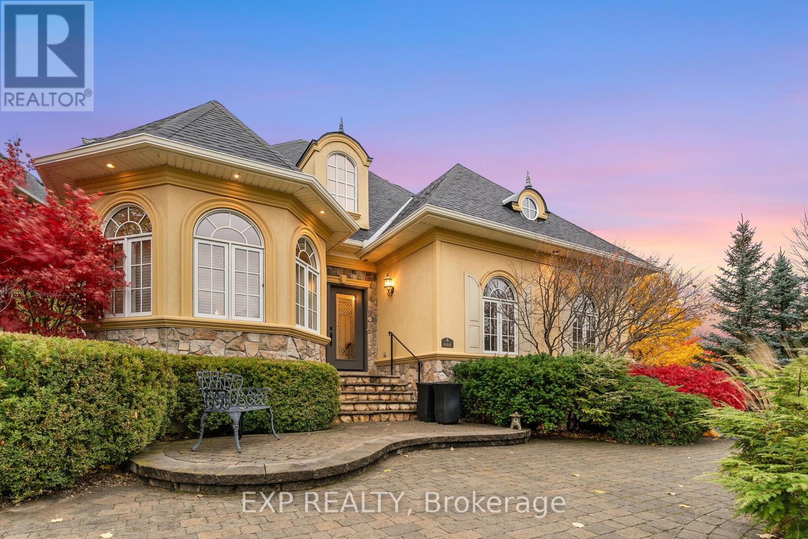 Front of home beautifully landscaped