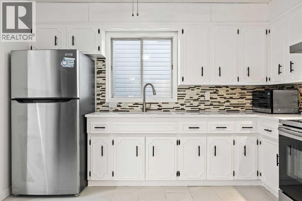 Single Family House Bi-level for Sale in  Falmere Way NE Falconridge Calgary 