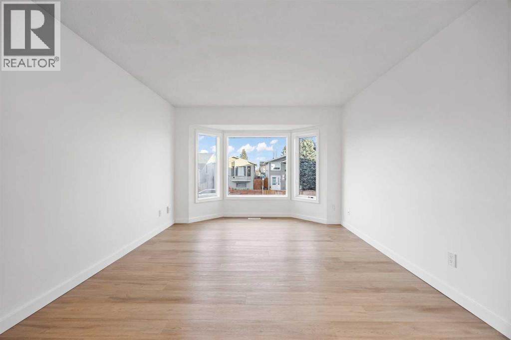 Single Family House Bi-level for Sale in  Falmere Way NE Falconridge Calgary 