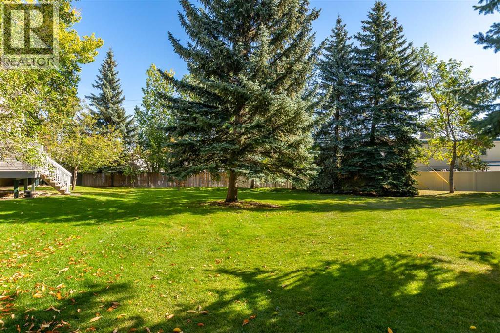 Single Family House 4 Level for Sale in  Kingsland Villas SW Kingsland Calgary 