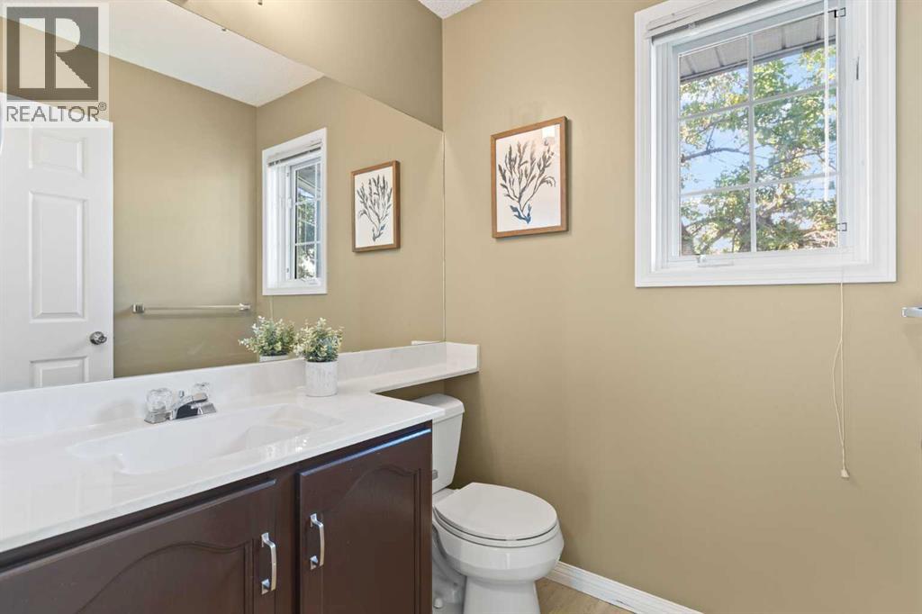 Single Family House 4 Level for Sale in  Kingsland Villas SW Kingsland Calgary 