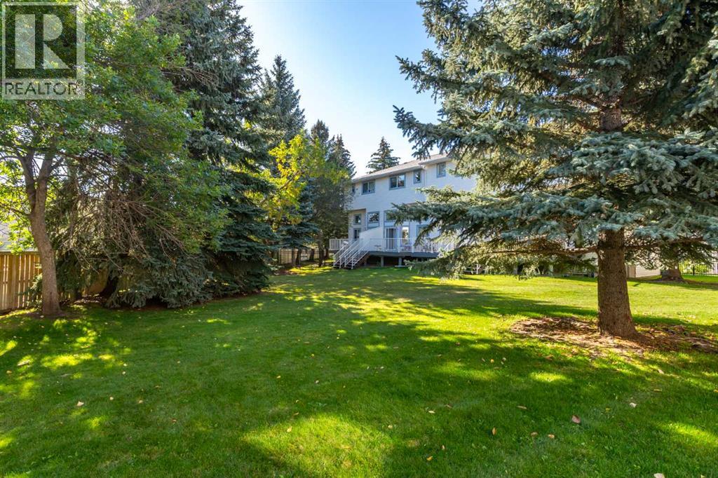 Single Family House 4 Level for Sale in  Kingsland Villas SW Kingsland Calgary 