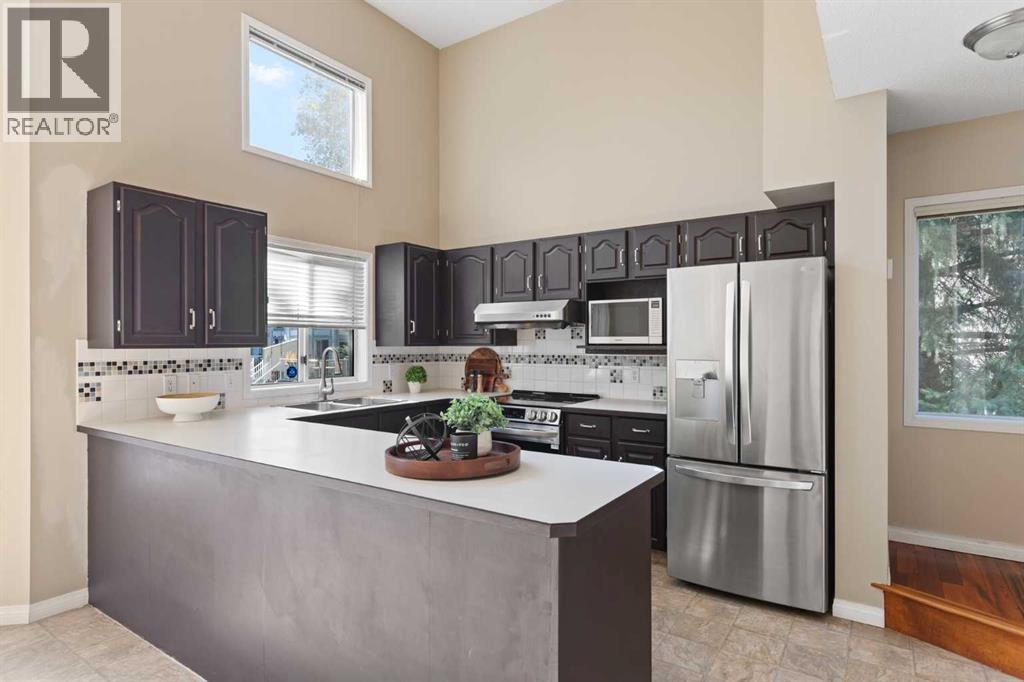 Single Family House 4 Level for Sale in  Kingsland Villas SW Kingsland Calgary 