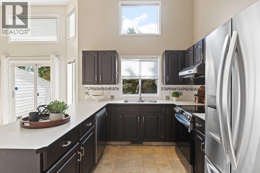 Single Family House 4 Level for Sale in  Kingsland Villas SW Kingsland Calgary 