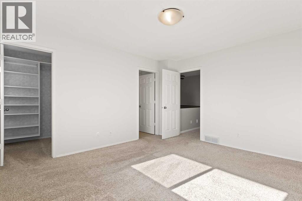 Single Family House 4 Level for Sale in  Kingsland Villas SW Kingsland Calgary 