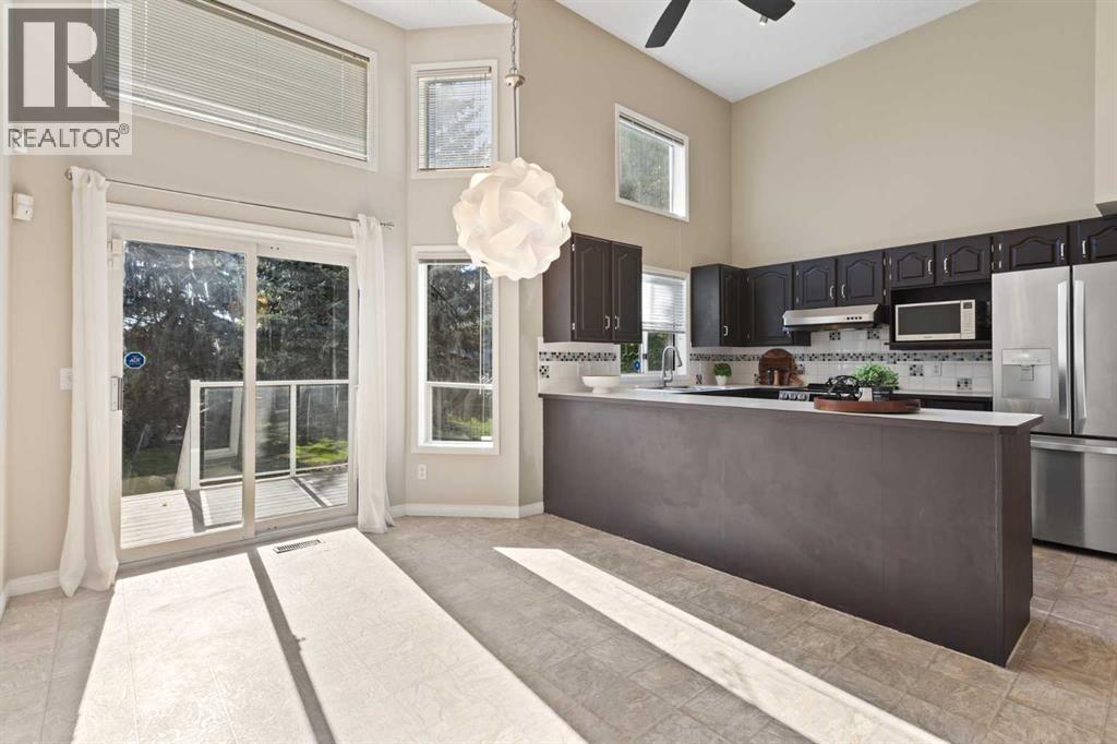 Single Family House 4 Level for Sale in  Kingsland Villas SW Kingsland Calgary 