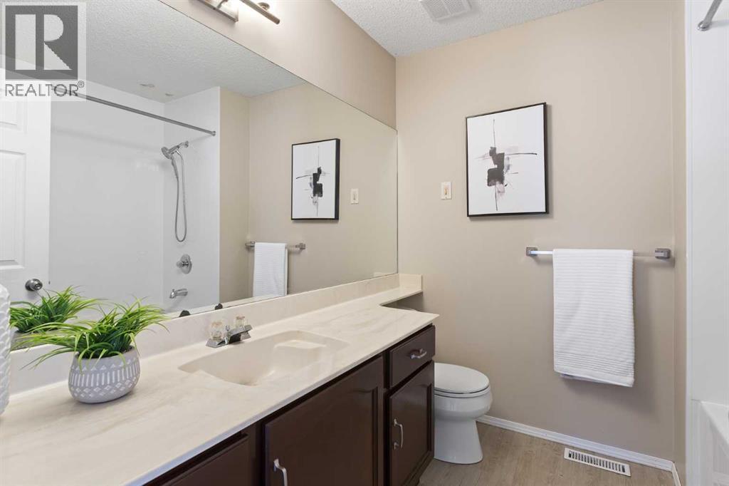 Single Family House 4 Level for Sale in  Kingsland Villas SW Kingsland Calgary 