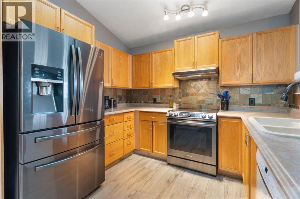 Single Family House Bi-level for Sale in  Hidden Spring Green NW Hidden Valley Calgary 