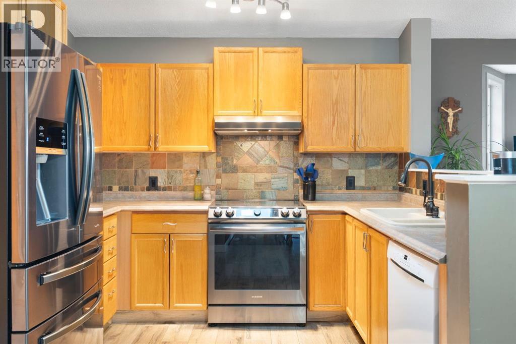 Single Family House Bi-level for Sale in  Hidden Spring Green NW Hidden Valley Calgary 