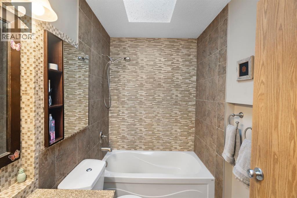 Single Family House Bi-level for Sale in  Hidden Spring Green NW Hidden Valley Calgary 