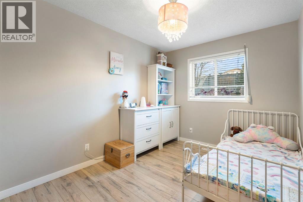 Single Family House Bi-level for Sale in  Hidden Spring Green NW Hidden Valley Calgary 