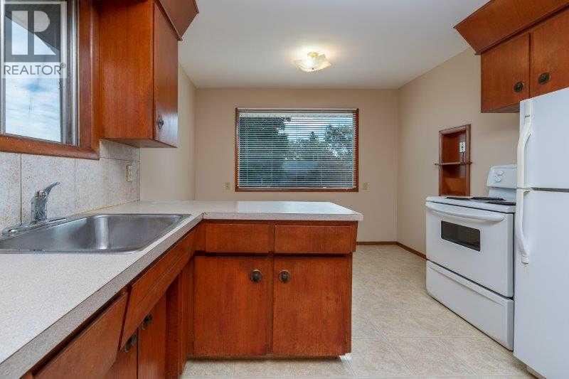 Multi-family House Bungalow for Sale in   Street SW Kingsland Calgary 