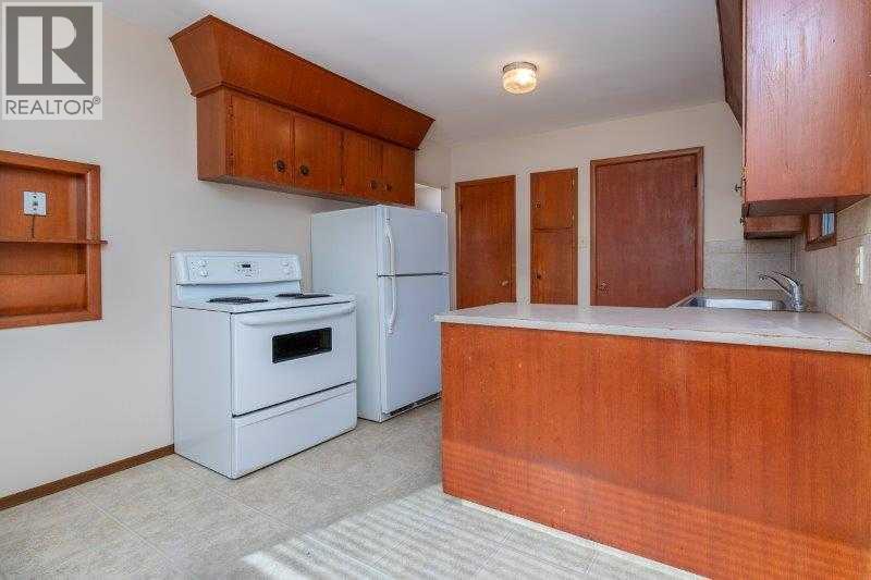 Multi-family House Bungalow for Sale in   Street SW Kingsland Calgary 