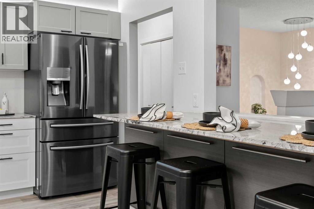 Single Family House Bi-level for Sale in  Bearspaw Drive NW Brentwood Calgary 