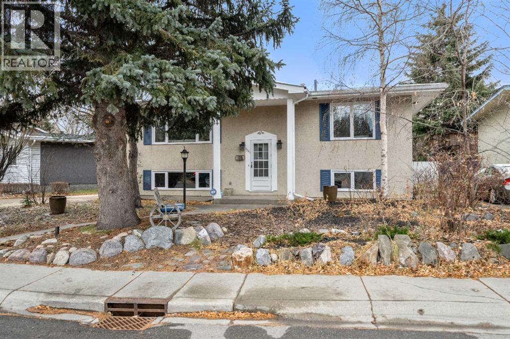 Single Family House Bi-level for Sale in  Bearspaw Drive NW Brentwood Calgary 