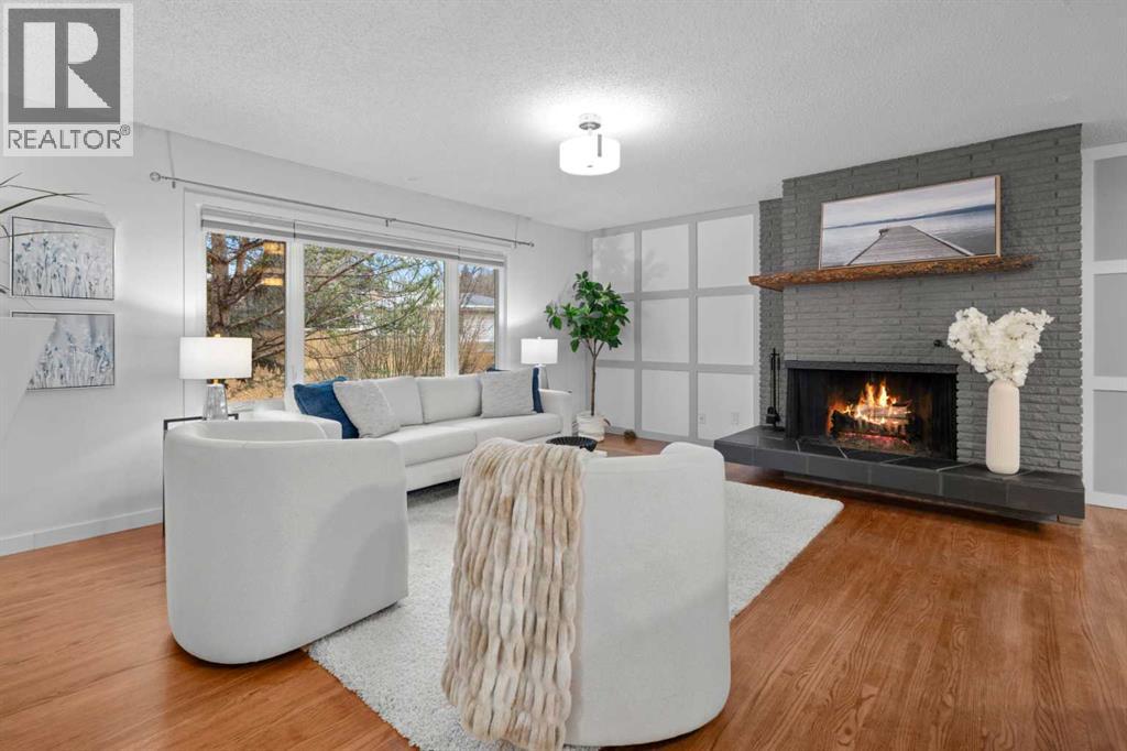 Single Family House Bi-level for Sale in  Bearspaw Drive NW Brentwood Calgary 