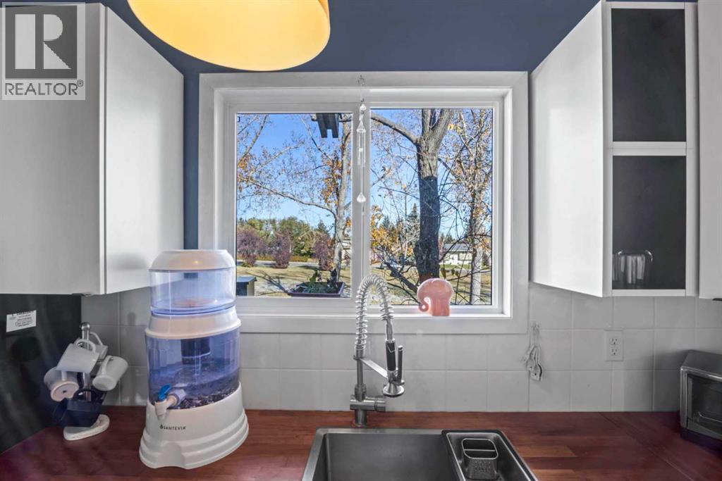 Single Family House Bi-level for Sale in   Braxton Place SW Braeside Calgary 