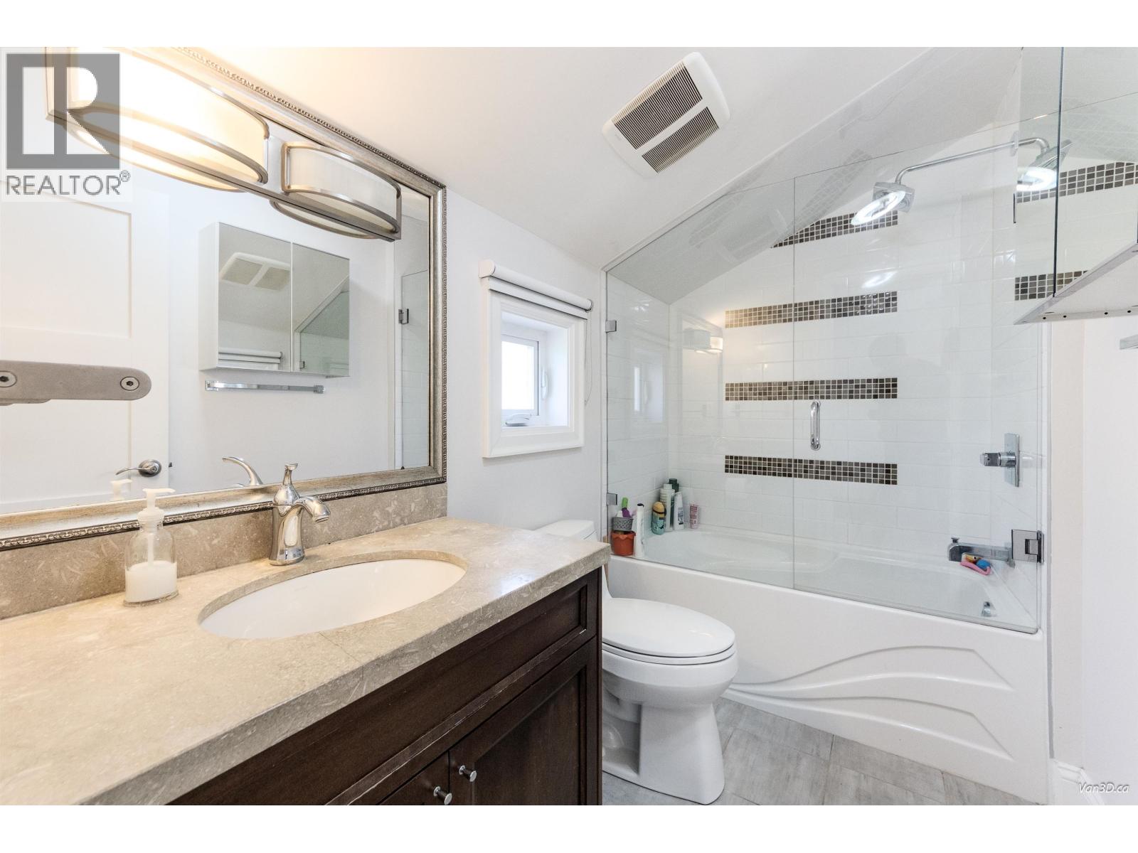 4698 W 11TH AVENUE, Vancouver