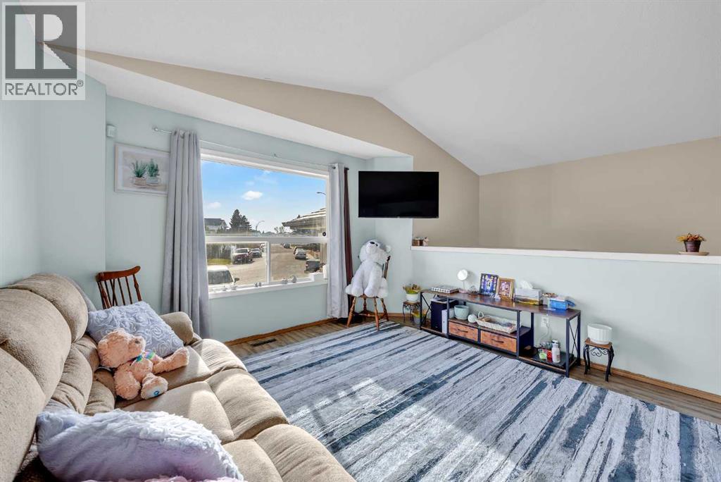 Single Family House Bi-level for Sale in  Applebrook Circle SE Applewood Park Calgary 