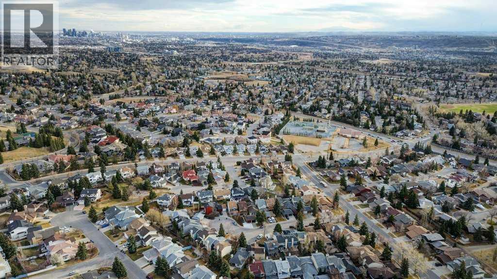 Single Family House 5 Level for Sale in  Hawkville Place NW Hawkwood Calgary 