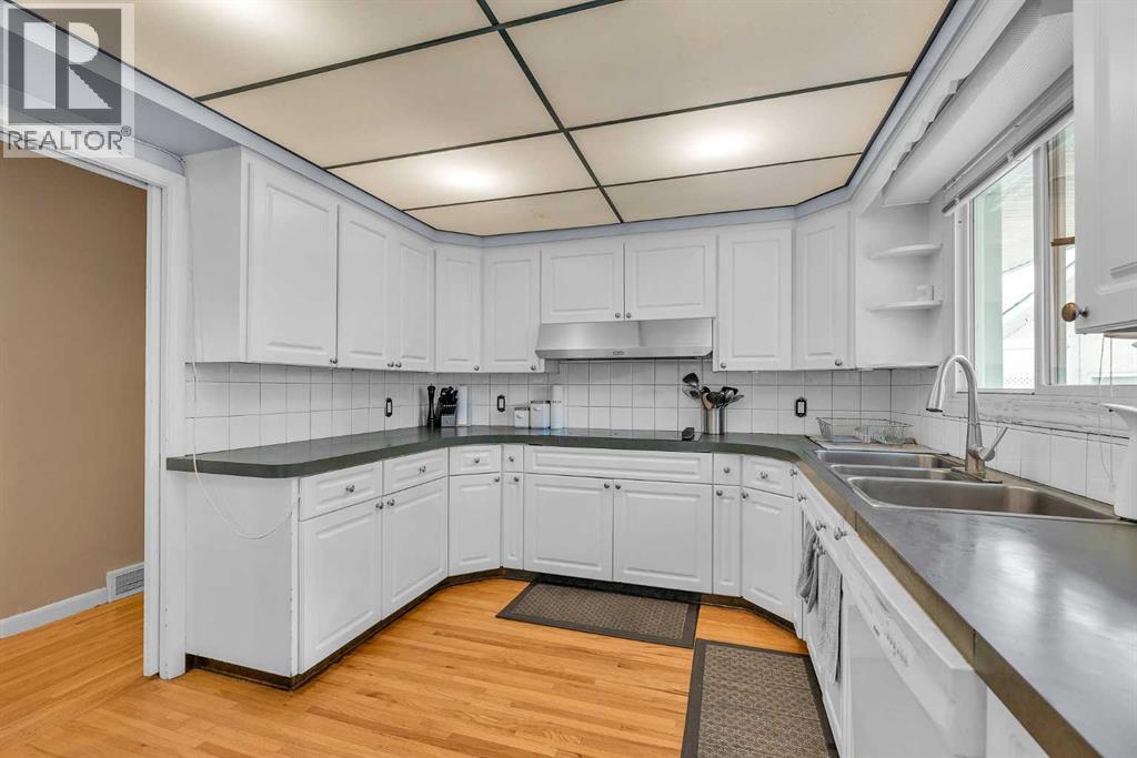 Single Family House Bungalow for Sale in  Halifax Crescent NW Banff Trail Calgary 