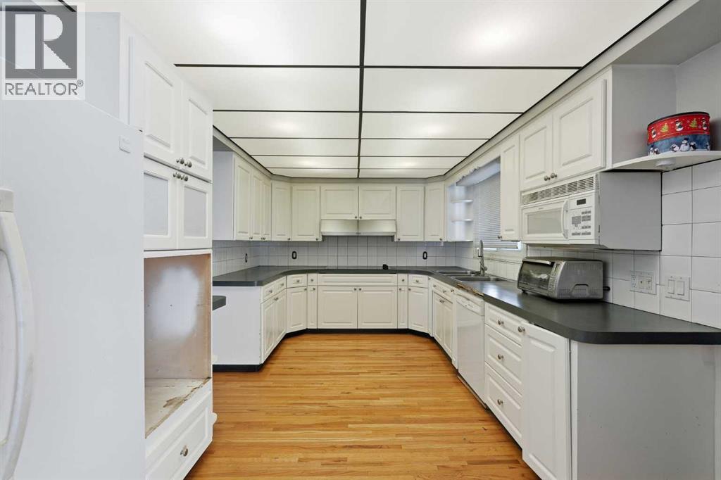 Single Family House Bungalow for Sale in  Halifax Crescent NW Banff Trail Calgary 