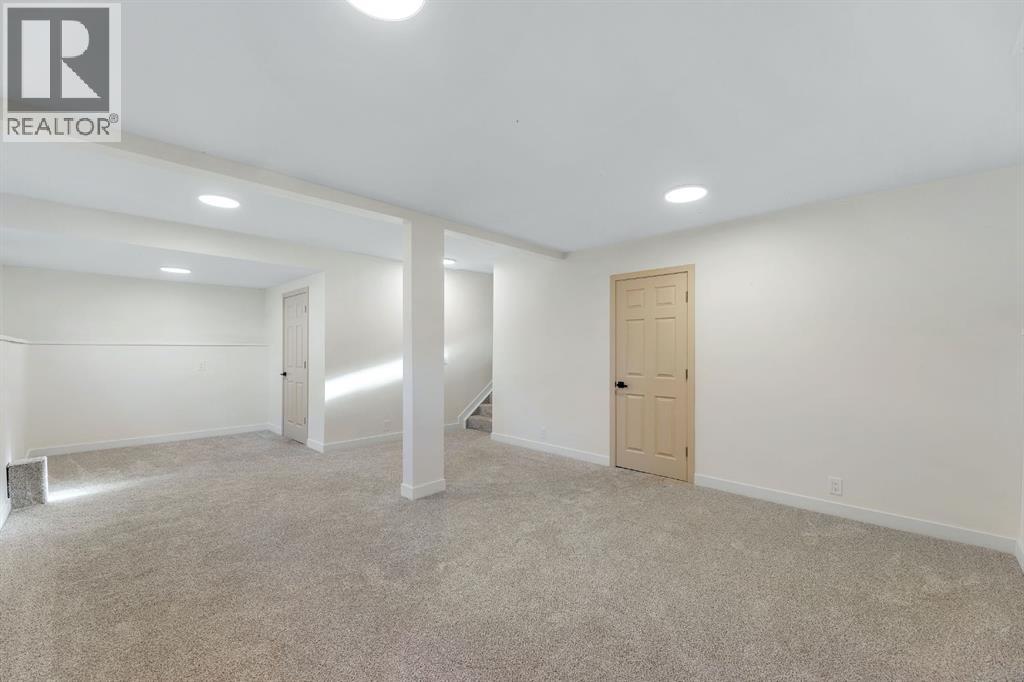 Single Family House 3 Level for Sale in  Midlawn Close SE Midnapore Calgary 