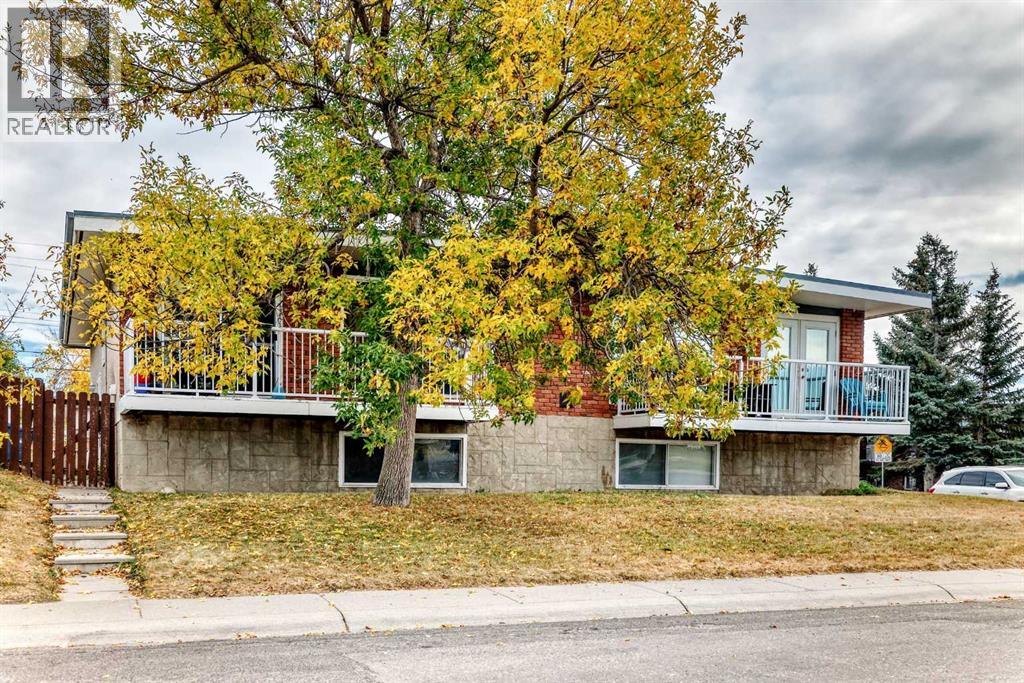 Multi-family House Bi-level for Sale in  &  Huntford Close NE Huntington Hills Calgary 