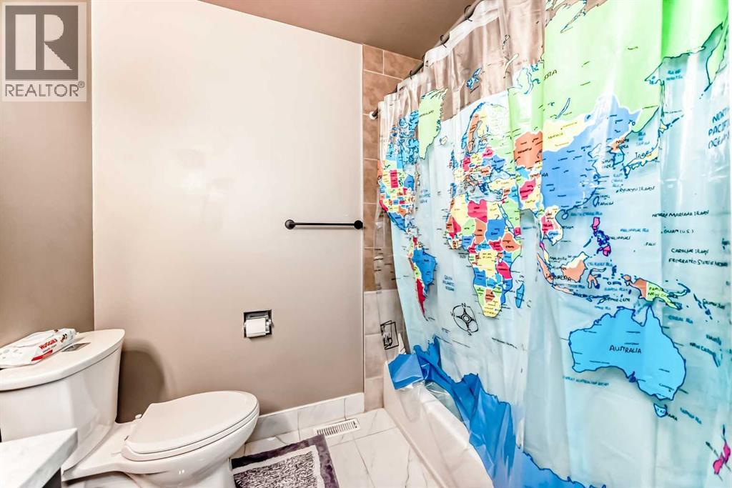 Multi-family House Bi-level for Sale in  &  Huntford Close NE Huntington Hills Calgary 