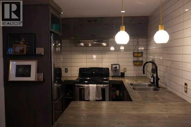 Single Family House Bungalow for Sale in  Creston Crescent NW Banff Trail Calgary 