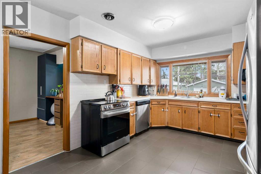 Single Family House Bungalow for Sale in  Creston Crescent NW Banff Trail Calgary 