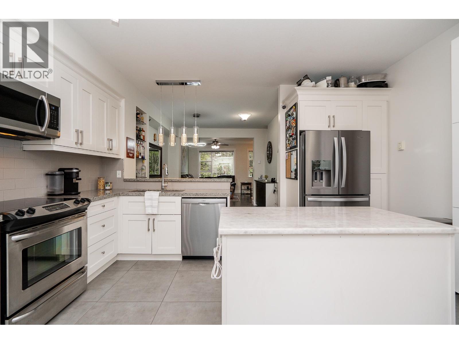 21 1299 COAST MERIDIAN ROAD, Coquitlam