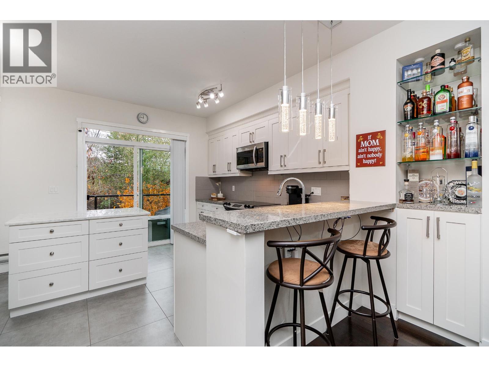 21 1299 COAST MERIDIAN ROAD, Coquitlam