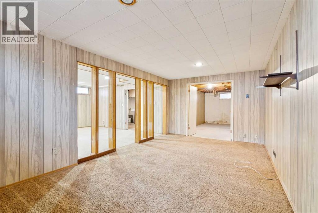 Single Family House Bungalow for Sale in  Bearspaw Drive NW Brentwood Calgary 