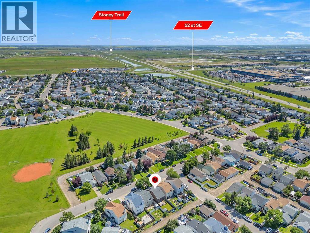 Single Family House 3 Level for Sale in  Erin Green Way SE Erin Woods Calgary 