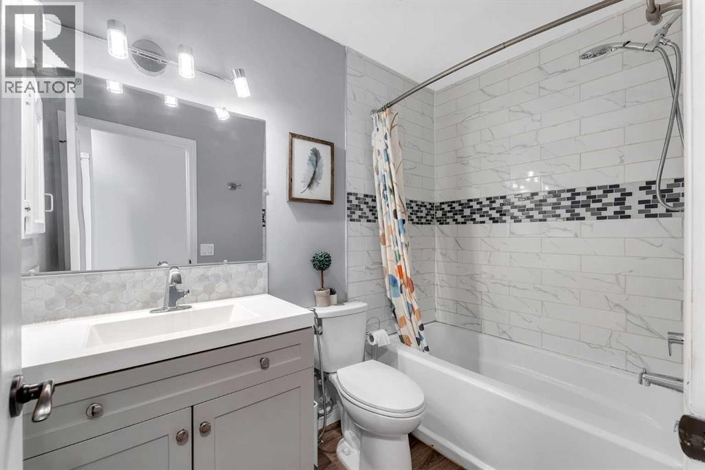 Single Family House 3 Level for Sale in  Erin Green Way SE Erin Woods Calgary 