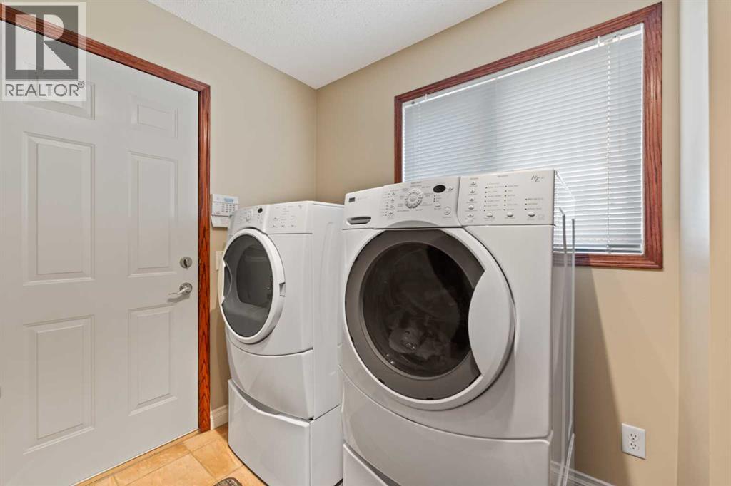 Single Family House for Sale in  Sienna Park Drive SW Signal Hill Calgary 