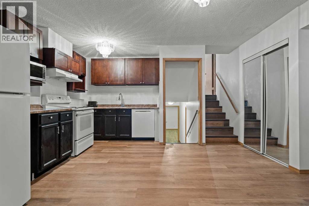 Single Family House 4 Level for Sale in  Laguna Way NE Monterey Park Calgary 