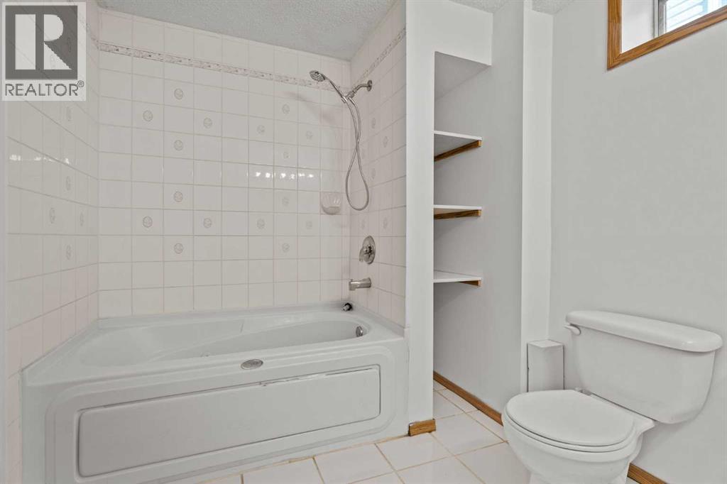 Single Family House 4 Level for Sale in  Laguna Way NE Monterey Park Calgary 