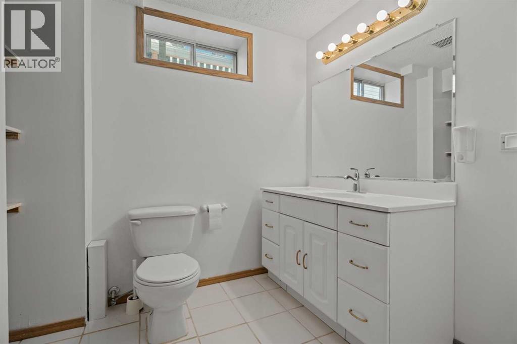 Single Family House 4 Level for Sale in  Laguna Way NE Monterey Park Calgary 