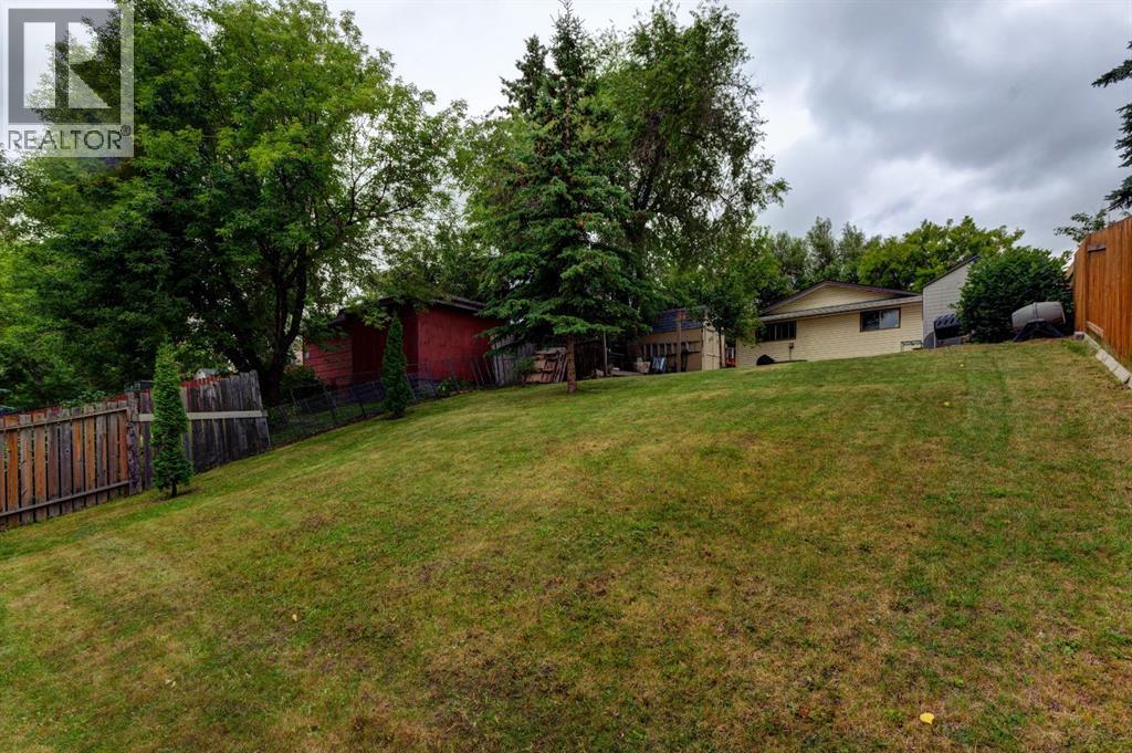 Single Family House Bungalow for Sale in  Cantrell Drive SW Canyon Meadows Calgary 