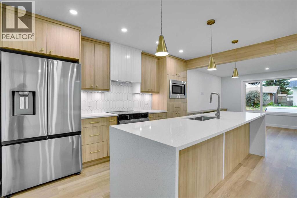 Single Family House 3 Level for Sale in  Allandale Close SE Acadia Calgary 