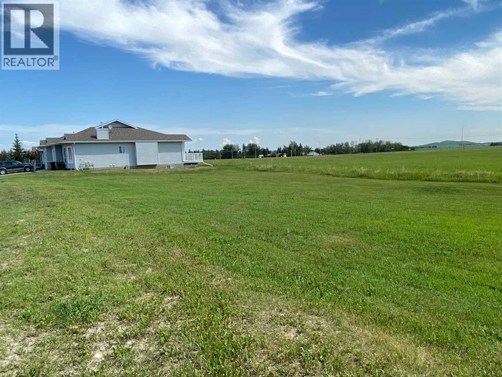 168/172 Ridge Stone Lane - Photo 4 of 7, Diamond Valley, Alberta