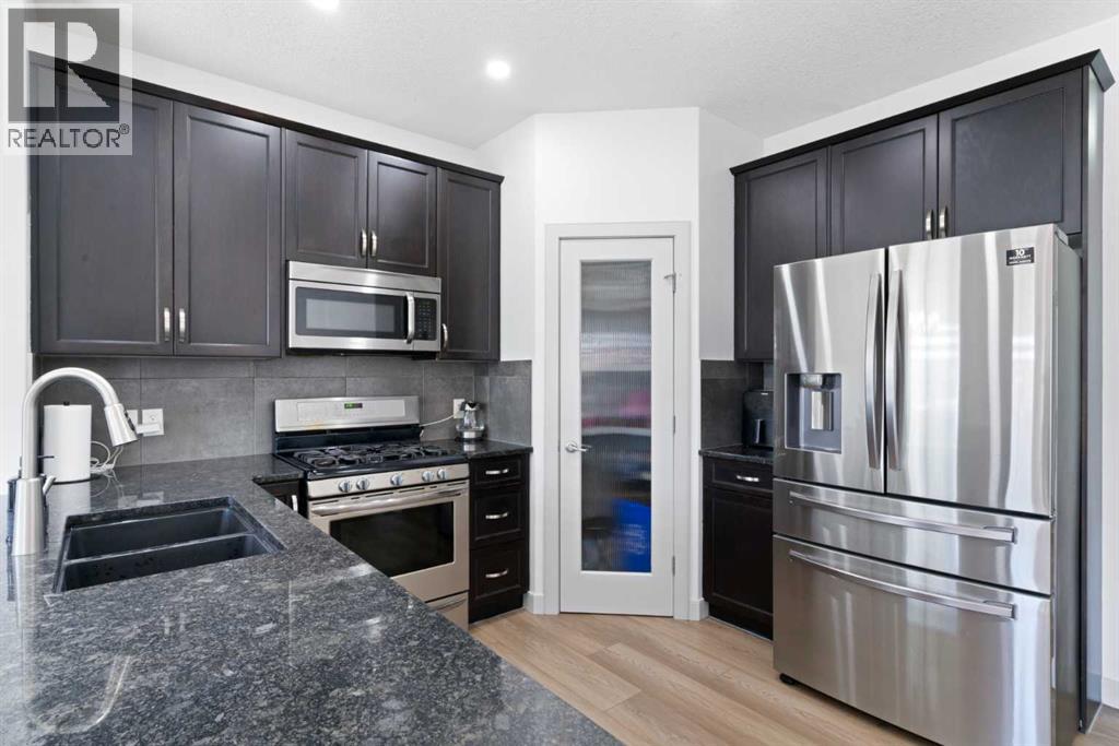 Single Family House for Sale in  Everhollow Rise SW Evergreen Calgary 